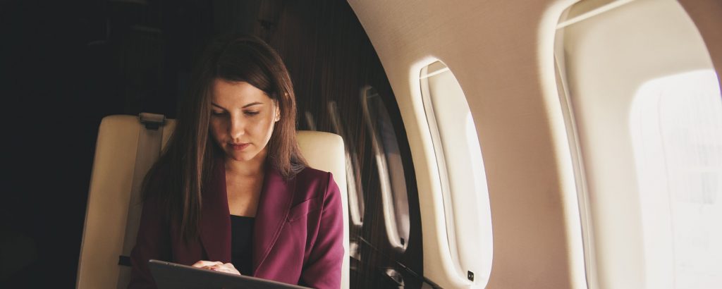 Woman using ad hoc private jet charter